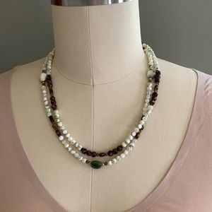 Necklace, 20” double strand hand strung w/shades of brown, cream, & green beads